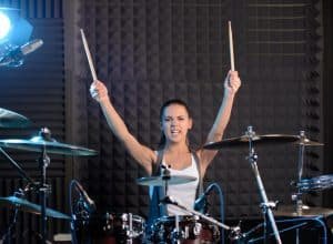 girl playing drum as a workout